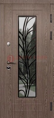 Металлическая дверь со стеклом и ковкой в стиле модерн ДСК-106 в Ногинске