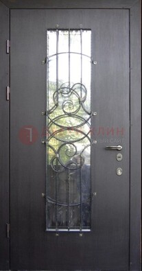Остекленная стальная дверь с ковкой ДСК-26 в Можайске