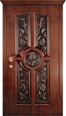 Филенчатая металлическая дверь с виноритом и резьбой ДВТ-69